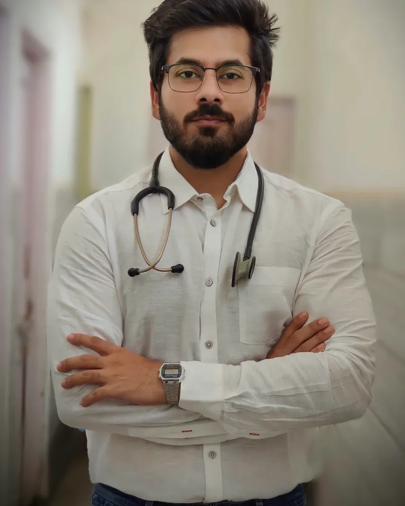 Portrait of Dr. Arjun Reddy, a man doctor in a white coat